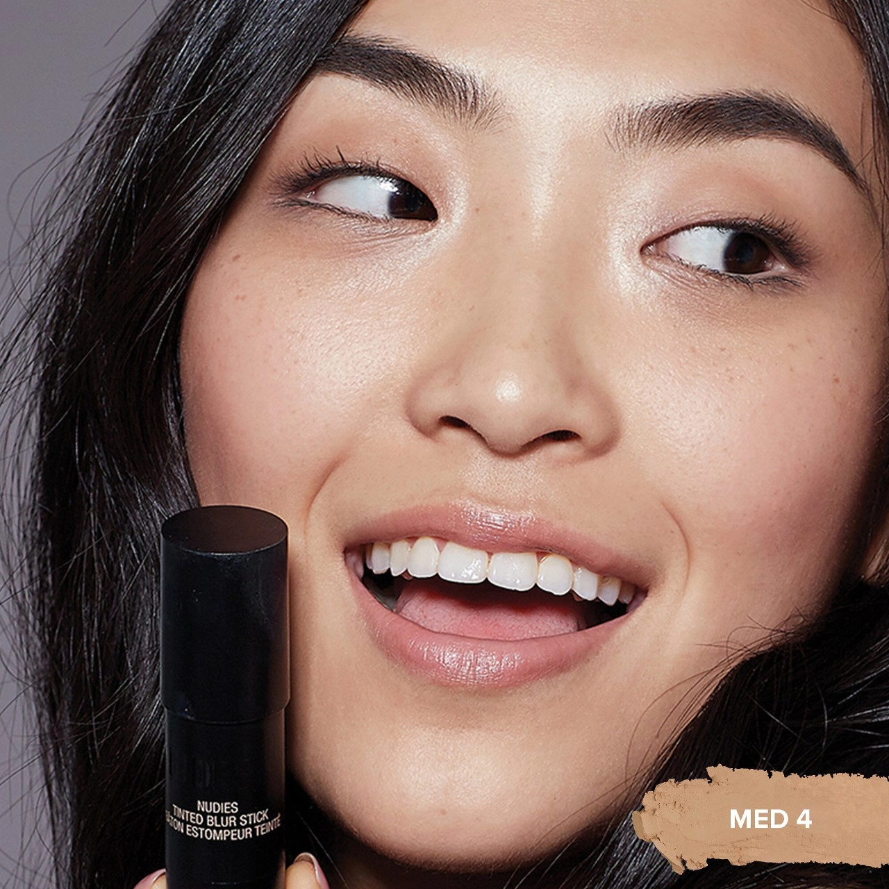 NUDESTIX Tinted Blur Foundation Stick Color: Nude Medium 4 - Light-Medium Nude - Image 3