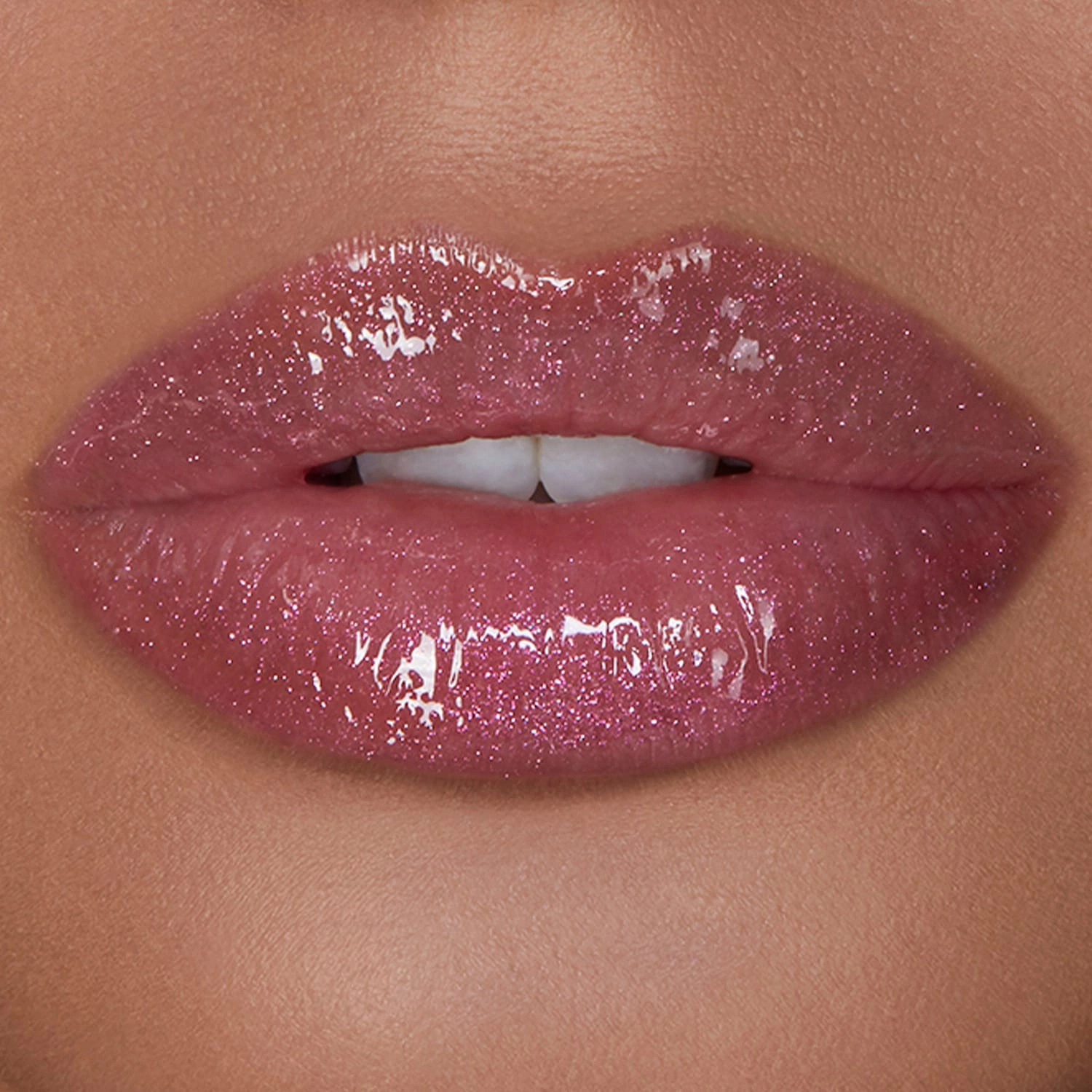 Hourglass Unreal™ High Shine Volumizing Lip Gloss - Cosmic Fuchsia with Pink Shimmer - Image 2