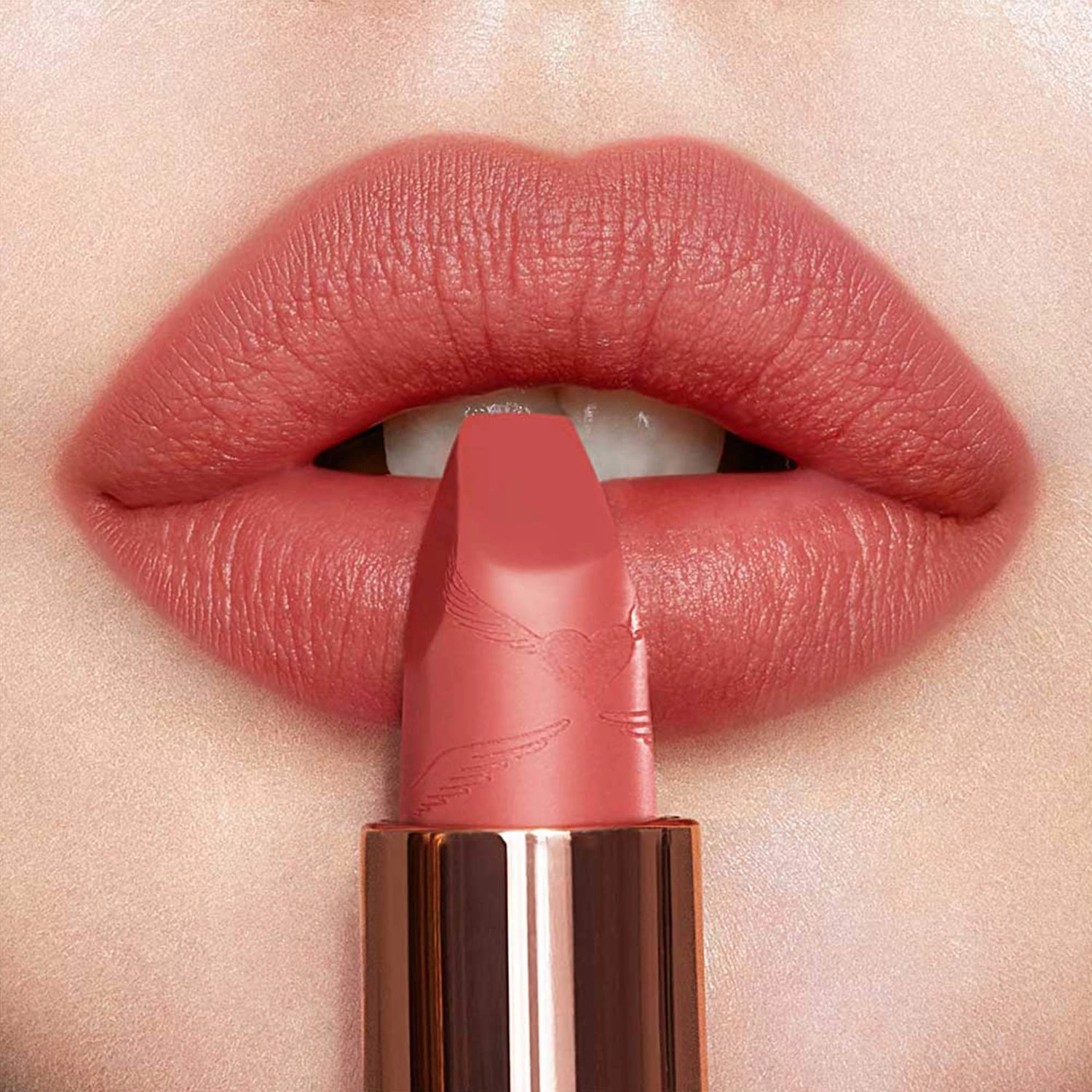 Charlotte Tilbury Matte Revolution Lipstick Color: Mrs. Kisses - Golden Peach - Image 10