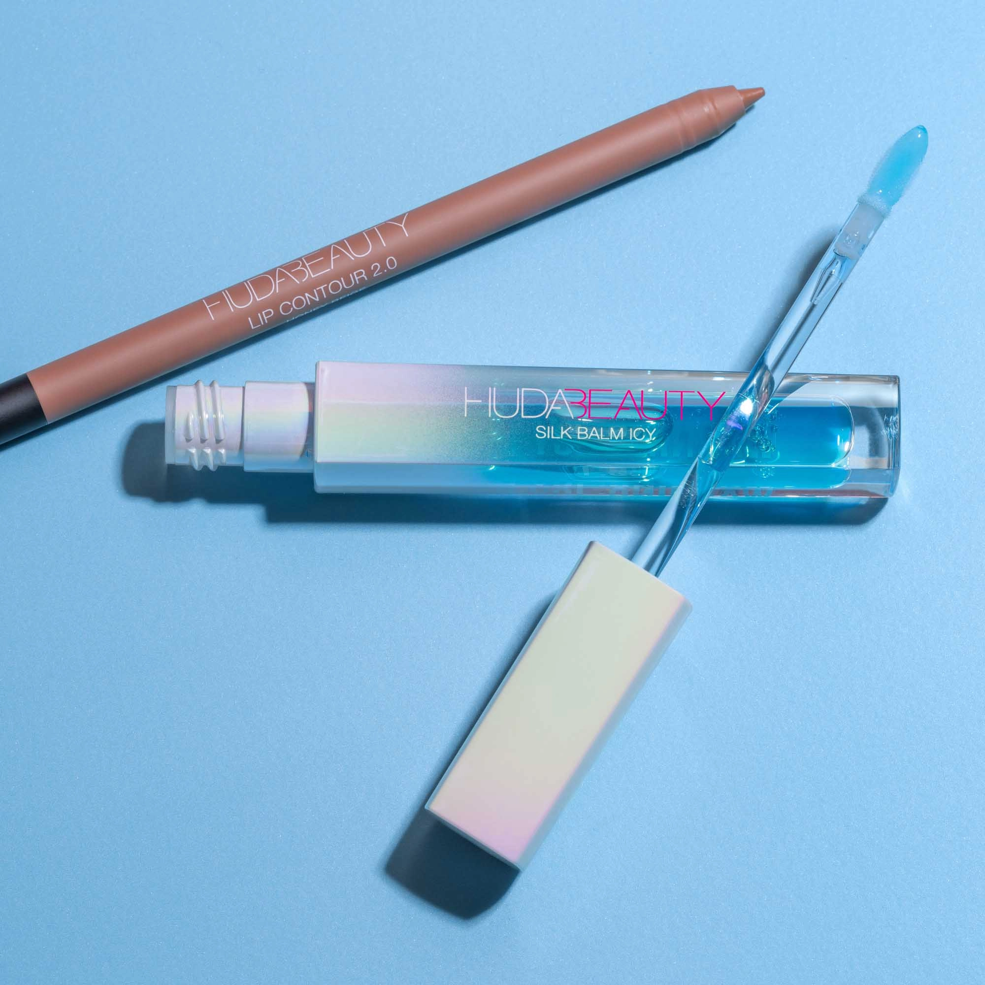 HUDA BEAUTY Silk Balm Icy Cryo-Plumping Lip Balm Color: Frost - Translucent Blue - Image 6