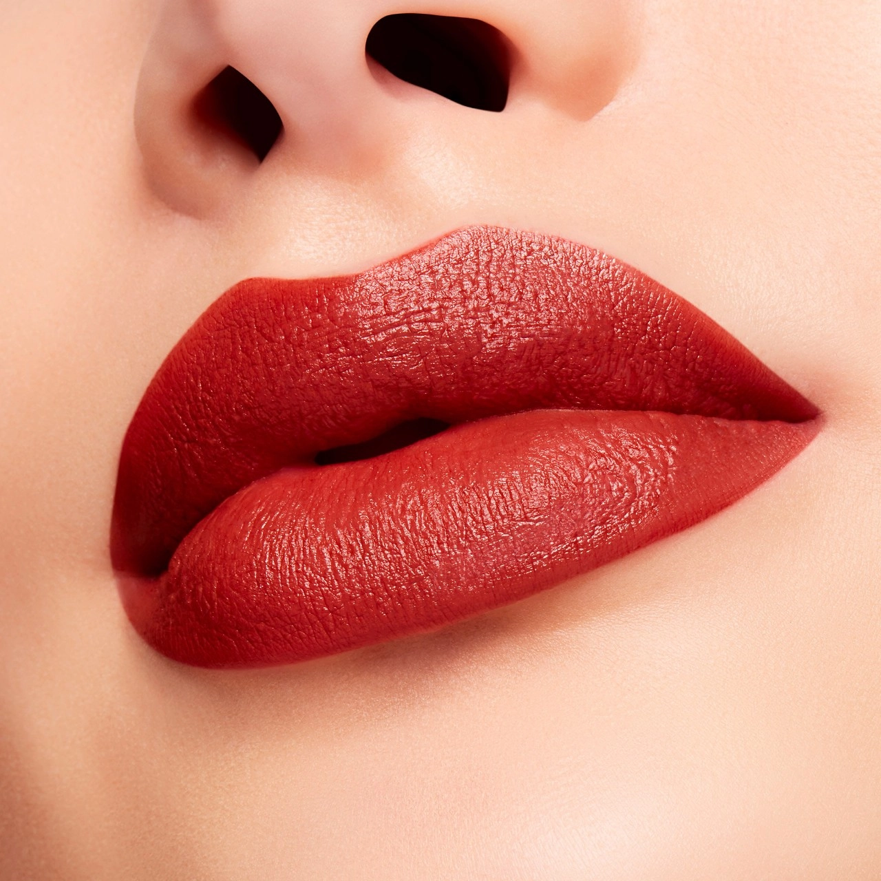 MAC Cosmetics Powder Kiss Velvet Blur Slim Stick Lipstick Color: Marrakesh-Mere - Intense Orange Brown - Image 3