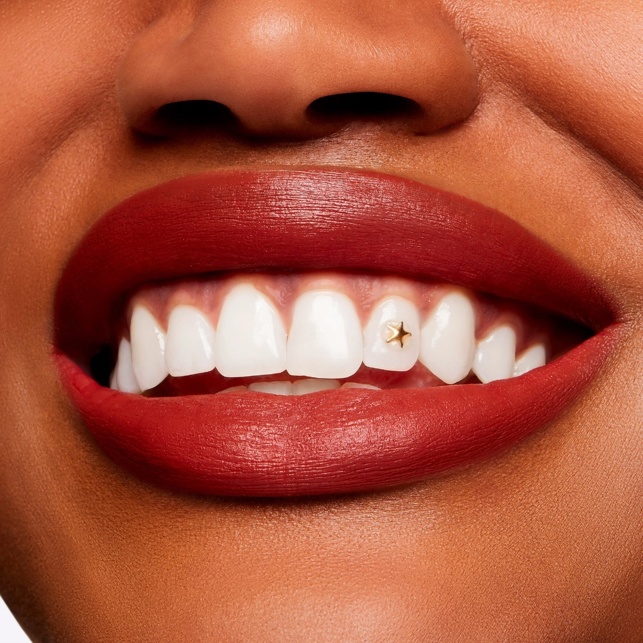 MAC Cosmetics Powder Kiss Velvet Blur Slim Stick Lipstick Color: Marrakesh-Mere - Intense Orange Brown - Image 5