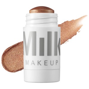 MILK MAKEUP Dewy Cream Highlighter Stick - Spark (Golden Copper)